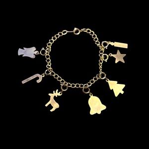 Vintage gold tone Christmas theme charm bracelet